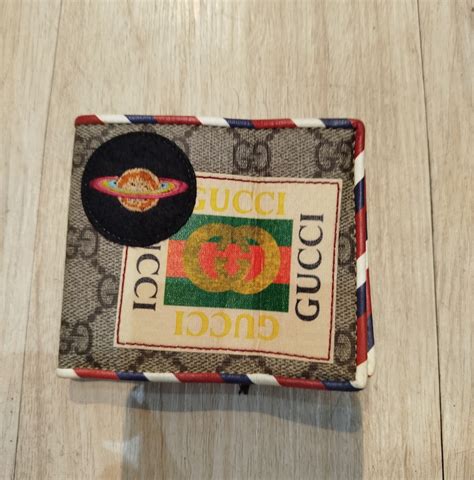 courrier gucci wallet